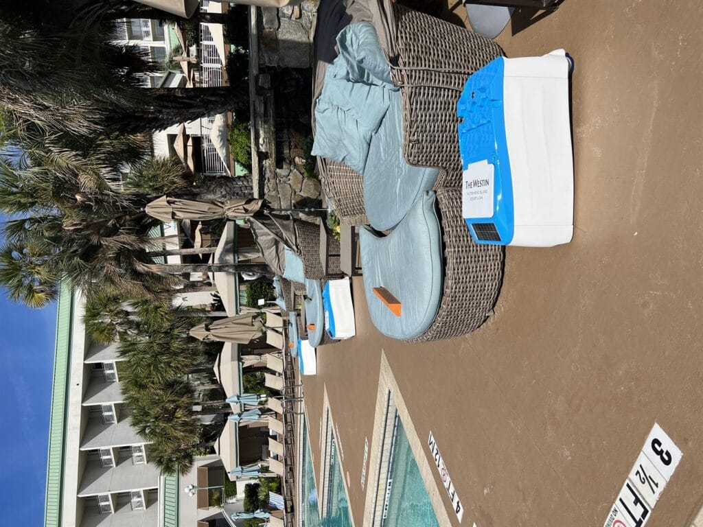 Resort pool deck with hospitality cabana technology and premium seating